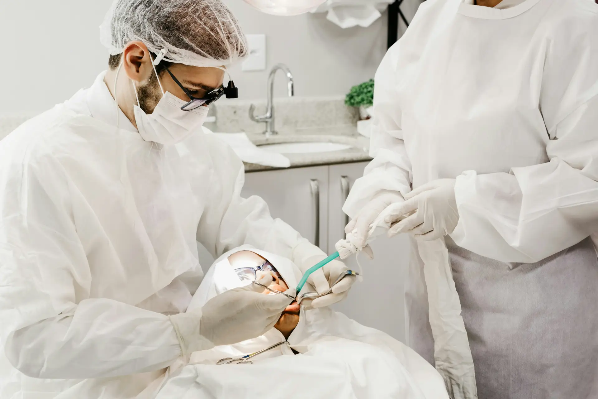 Dentist preparing for an emergency tooth extraction.