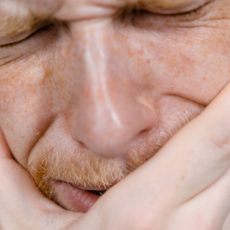Man trying ti find home remedies for his tootache